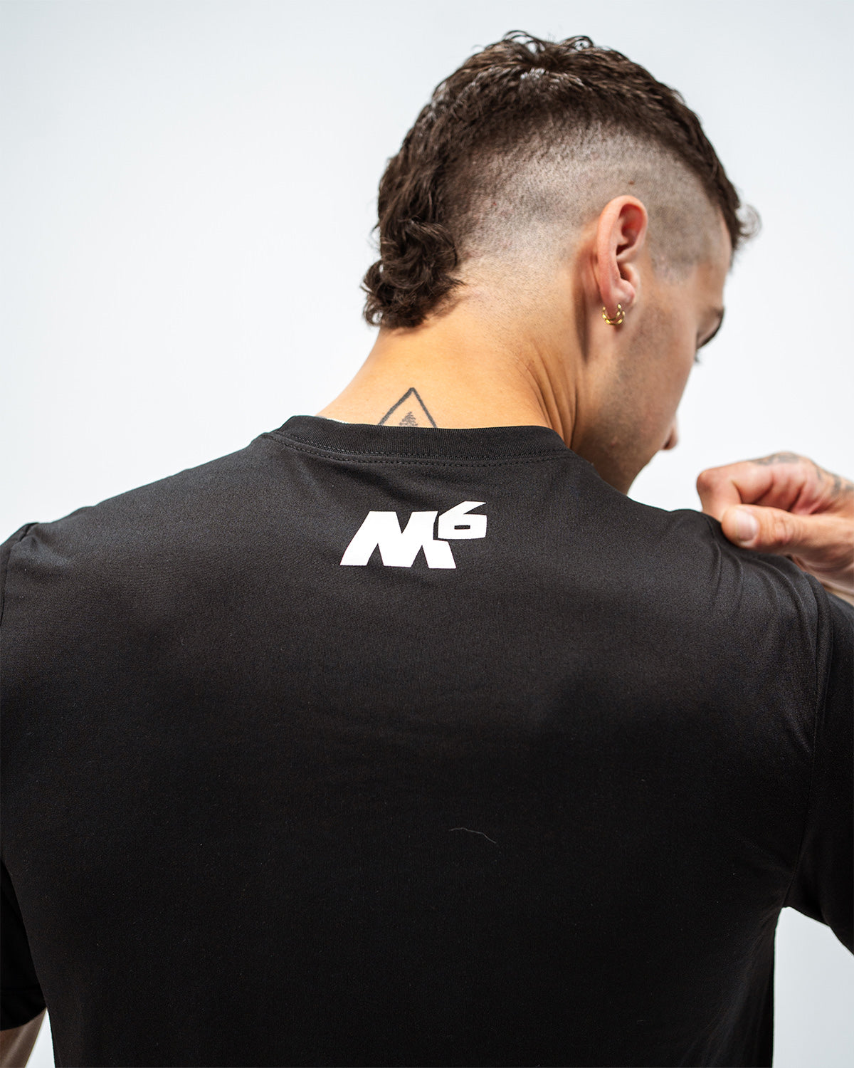 Black 1 of 1 Tee
